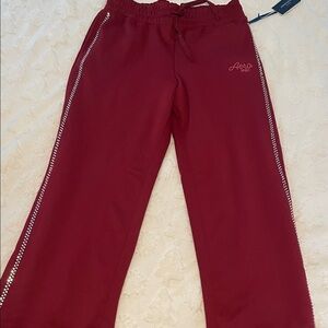 Aeropostale women Burgundy Boot Cut Pants. New. Size L